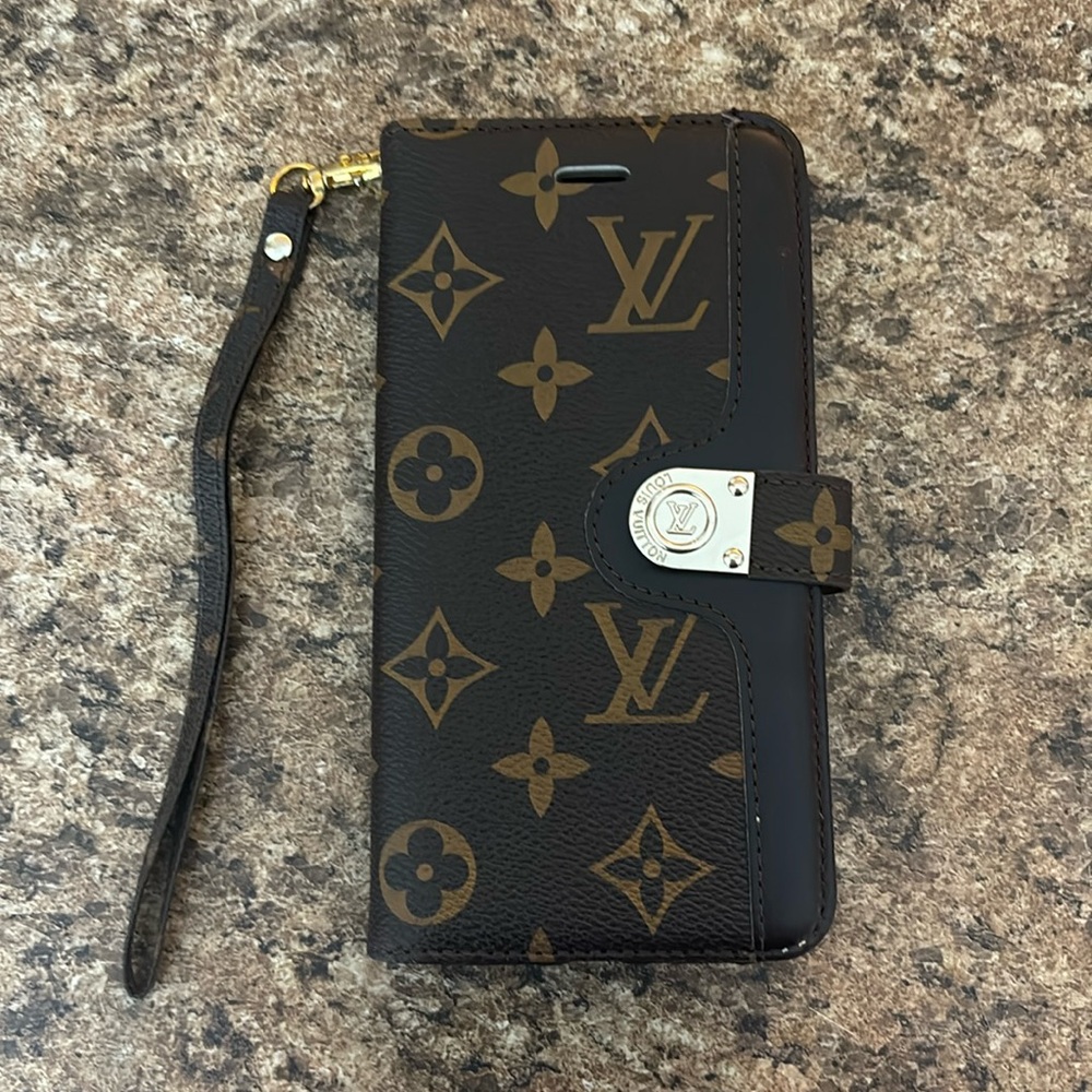Lightly used authentic Louis Vuitton iPhone XR phone case .